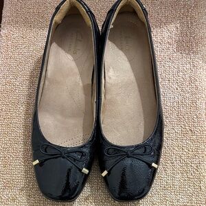 Clarks Women's Glossy Black Flats with Bow
